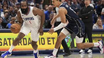 James Harden (L) was influential in the Clippers' playoff win over Aussie Josh Green's (R) Mavs. (AP PHOTO)