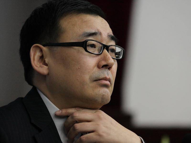 Yang Hengjun is facing the prospect of life behind bars in China following his guilty verdict. (AP PHOTO)